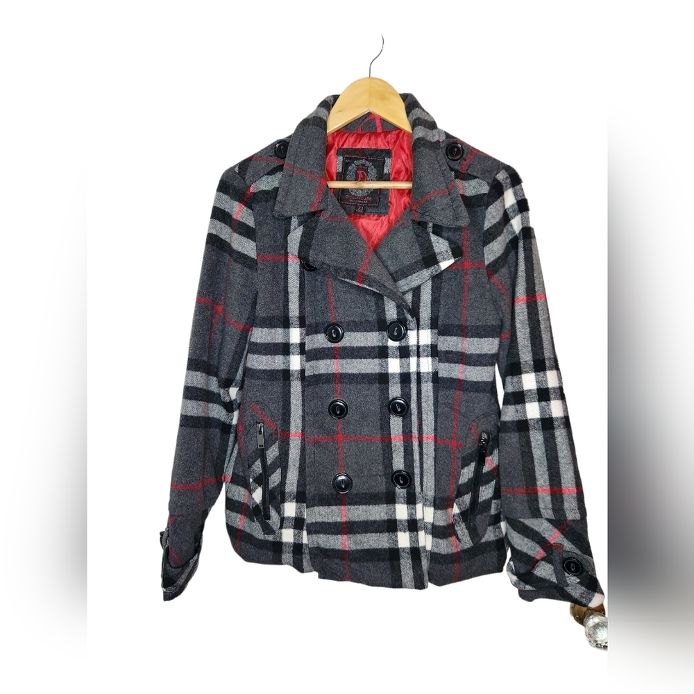 Dolls Kill pea coat with zipper pockets.